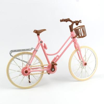 Modisches, wunderschönes rosa Fahrrad, abnehmbares Fahrrad mit braunem Kunststoff-Helm, Spielzeug
