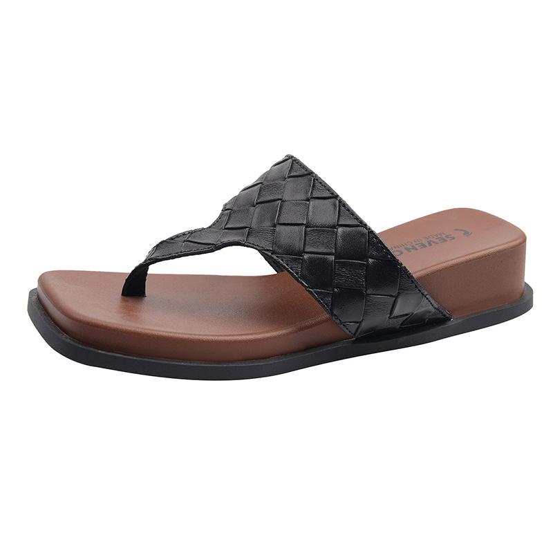 

Black high-end non-slip thick-bottomed slope heel flip-flops for women s summer outer wear 2025 new skirt heightening cool slippers 40