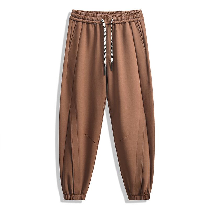 

Spring and Autumn new casual sweatpants loose simple fashion men s leggings sweatpants versatile green and young solid color men s clothing 4XL