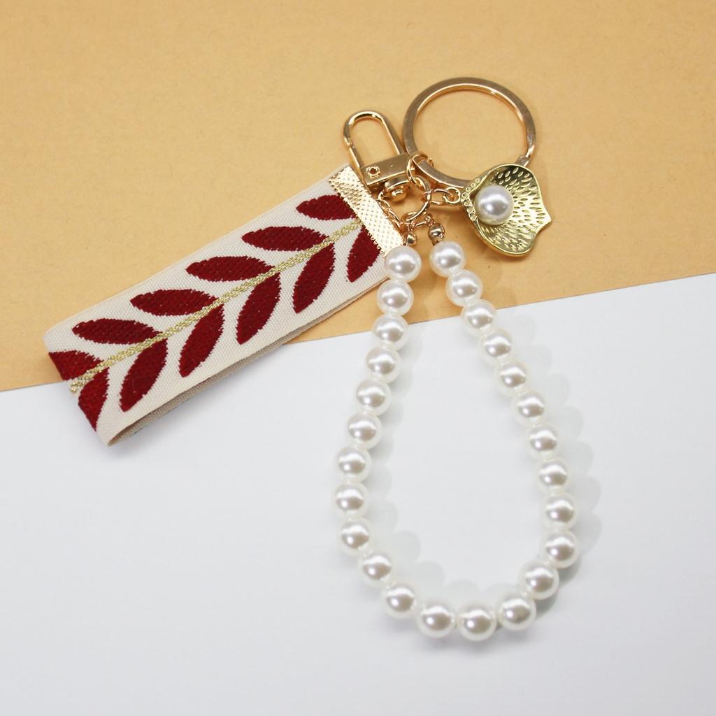 Trending 2025 Keychain Set Fashion Minimalist Pearl Car Keychain Woven Stripe Bag Charm Elegant Women Keychain Organizer Gift