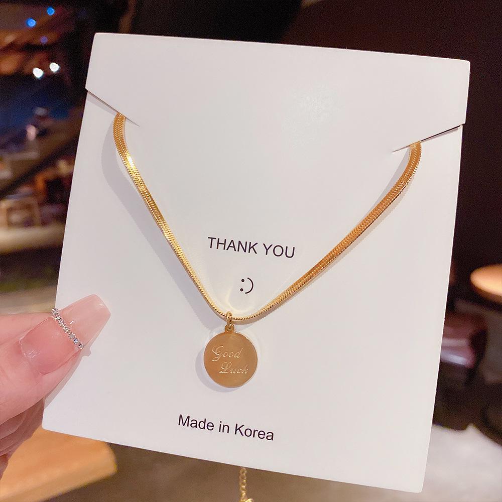 Minimalist Clavicle Necklace: Japanese & Korean Style, Luxurious Real Gold-Plated Titanium Steel Pendant for Women