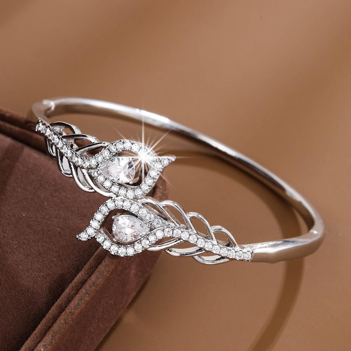 

Модный креативный дизайн с перьями, инкрустированный цирконом, усовершенствованный легкий, роскошный, темпераментный, универсальный браслет с отверстием серебряный