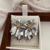 High-End Metal Irregular Flower Stud Earrings Atmospheric Earrings Luxury Personality Fashionable Petal Earrings