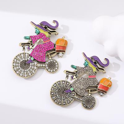 Broche de sorcière cycliste à la mode avec diamants dégoulinant d'huile personnalité créative niche accessoires de dessin animé