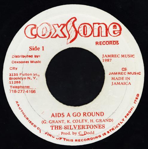 

7-дюймовая пластинка SILVERTONES AIDS A Go Round NONE Coxsone Records 1987 Ямайка Регги Ска Даб Б/у