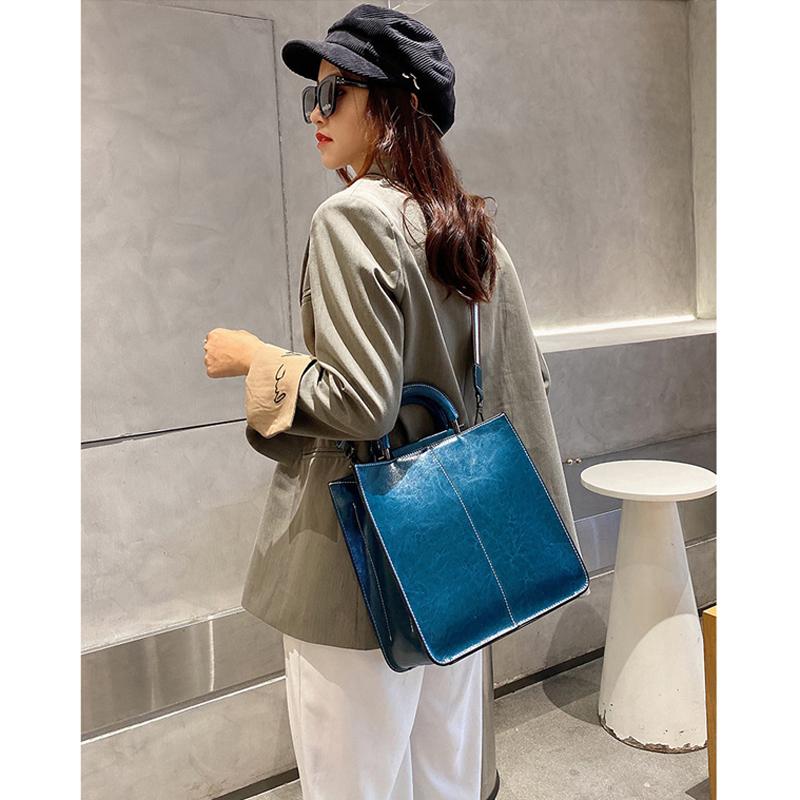 Bolsos de cuero auténtico para mujer, bolso de mano de lujo con cremallera, bolsos de mano de piel de vaca, bolso bandolera de diseñador