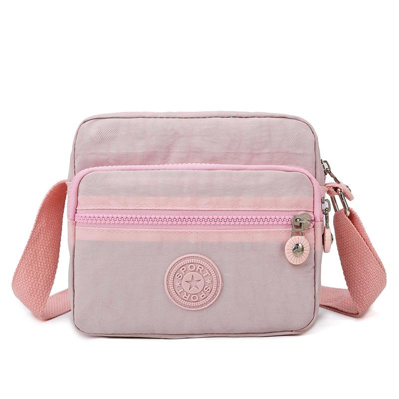 

New Oxford cloth shoulder women s bag large capacity simple anti-splashing messenger bag light casual wide shoulder strap small square bag Upgrade Thickened Single Pack розовый