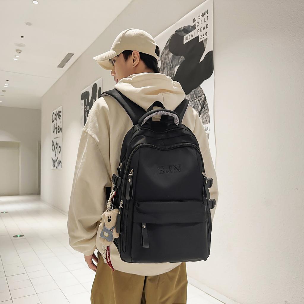 Schoolbag men's and women's burden reduction schoolbag middle and high school students letter printing simple backpack strong and durable large