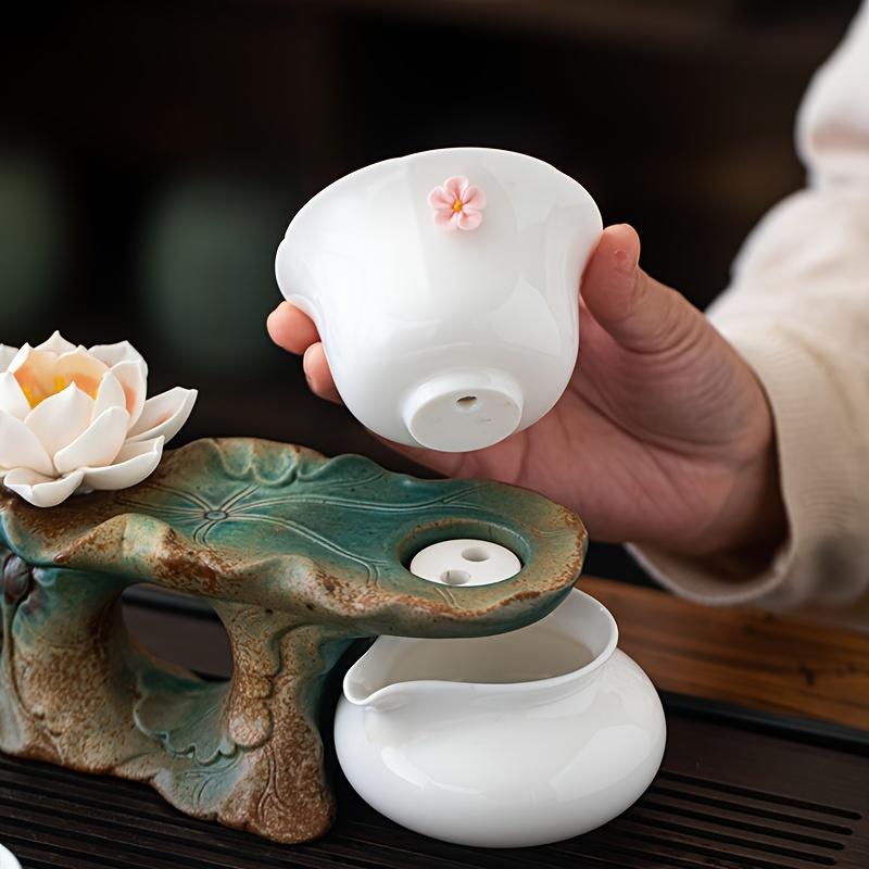 1 sada Keramická čajová souprava Kung Fu s designem Lotus Poloautomatická čajová souprava Líný čaj s rotační funkcí Ceremony Příslušenství 6 šálků s podnosem na čaj For Livin