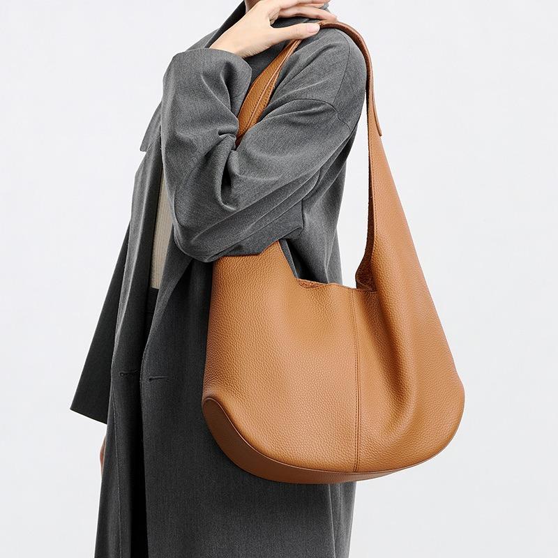 Shoulder bag women's armpit red versatile fashion first layer cowhide commuting sense large capacity women's tote bag
