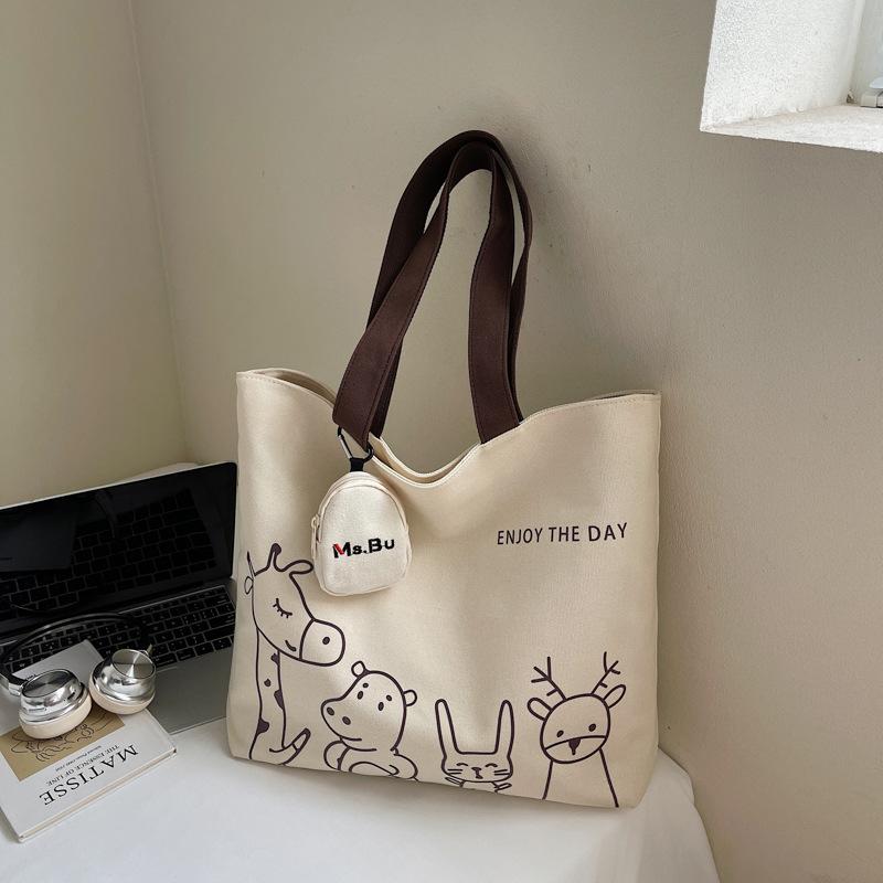 2025 autumn new leisure commuter large-capacity canvas bag women's niche shoulder bag graffiti portable tote bag