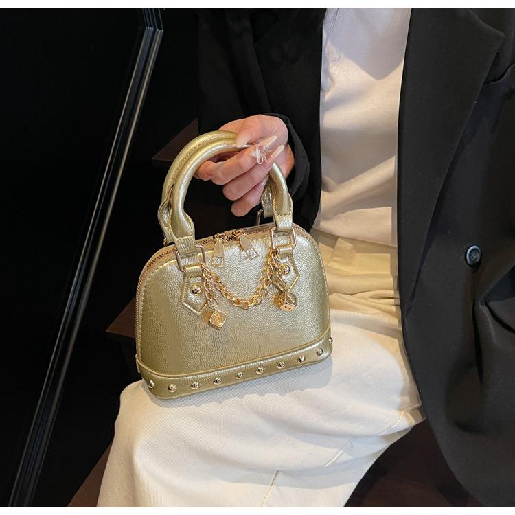 Popular portable shell small bag women's 2025 new high-end rivet saddle bag fashionable shoulder messenger bag