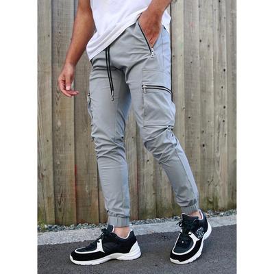 Pánské cargo kalhoty se stahovací pasem, design s kapsami na zip, úzký střih, manžety u kotníků, ležérní streetové oblečení, dlouhé kalhoty