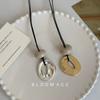 Niche design minimalist water drop pendant long necklace women's high-end sense cold leather rope sweater chain with accessories