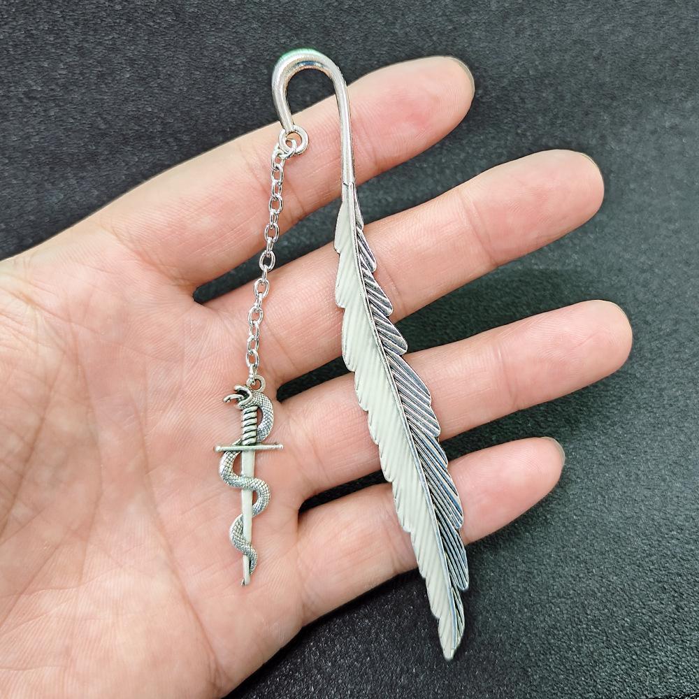 Glowing Snake Sword Bookmark: Luminous Feather Design, Retro Bao Jian Treasure Sword, Perfect for Students & Creative Minds