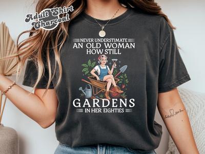 Never Underestimate an Old Woman Who Still Gardens In Her Eighties Shirt, Shirts For Gardening Moms, Gardener Gift, Plant Shirts Mothers Day