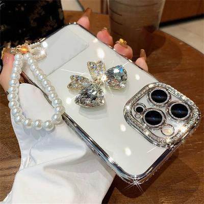 Etui z łańcuszkiem z pereł, z chromowaną obwódką, diamentową kokardą 3D, odporne na wstrząsy, tylna okładka dla iPhone 15 14 13 12 11 Pro Max X XS XR