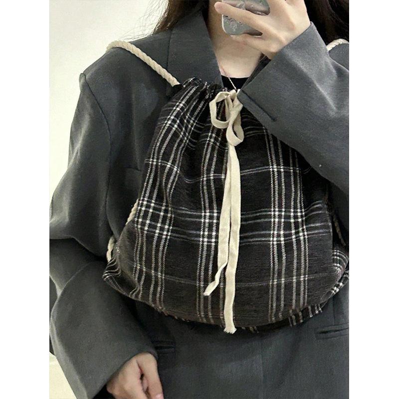 Japanese lazy wind canvas bag women's autumn and winter new simple niche drawstring backpack student class schoolbag