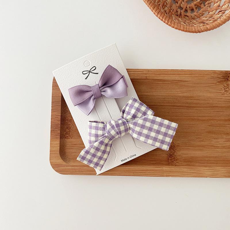 2 Purple Bowknot Hair Clips, Perfect for Korean-style Young Girls, Versatile for Youthful Bangs and Hair Accessories.