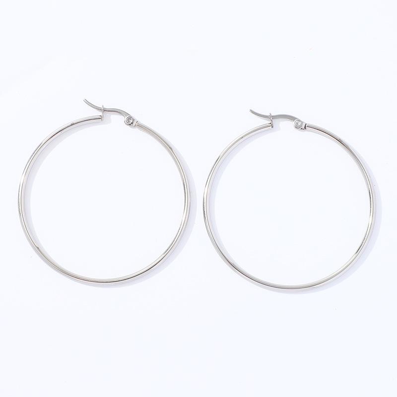 Pendientes de aro geométricos de acero inoxidable dorado con estrella de cinco puntas