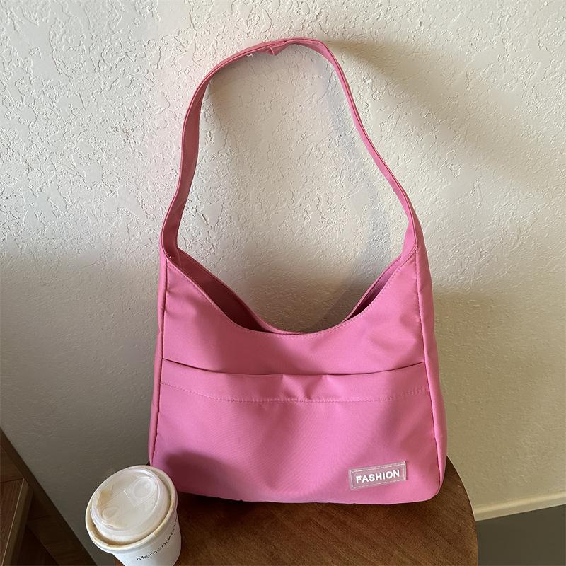 

Casual Oxford cloth large capacity autumn 2025 new pendant trendy fashion oblique span tote armpit bag