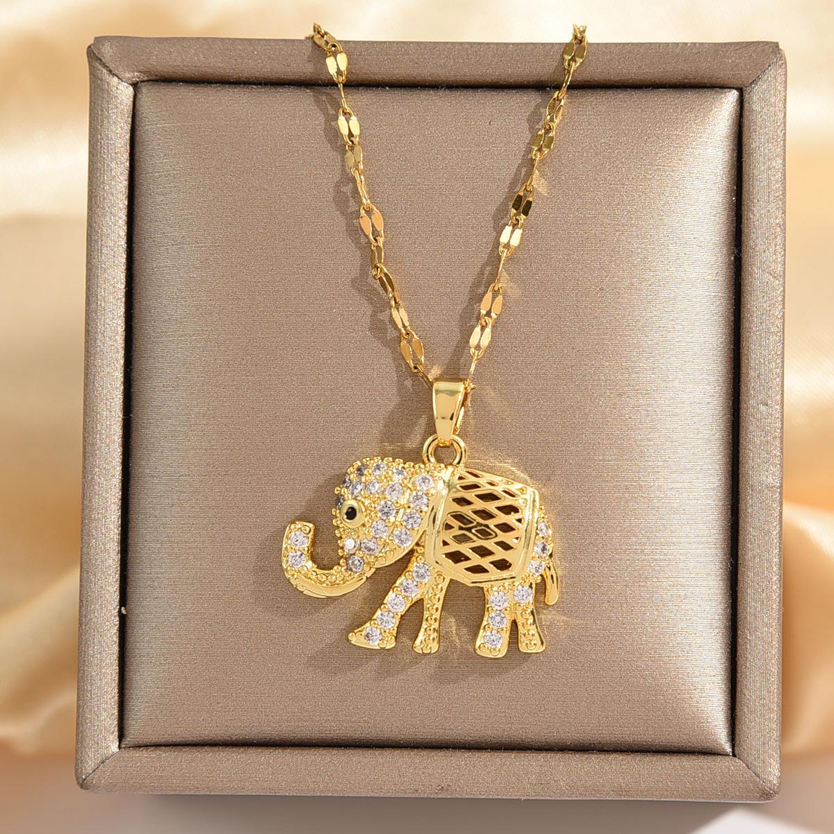 

Золотое ожерелье с подвеской в виде слона