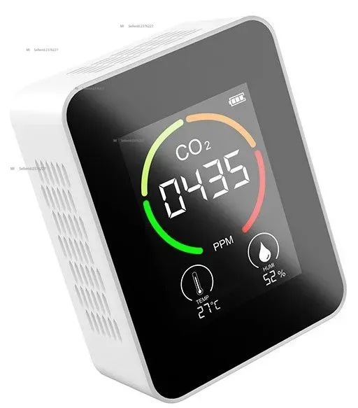 Air quality monitor. Measurement of CO2 concentration, temperature and humidity. White body.