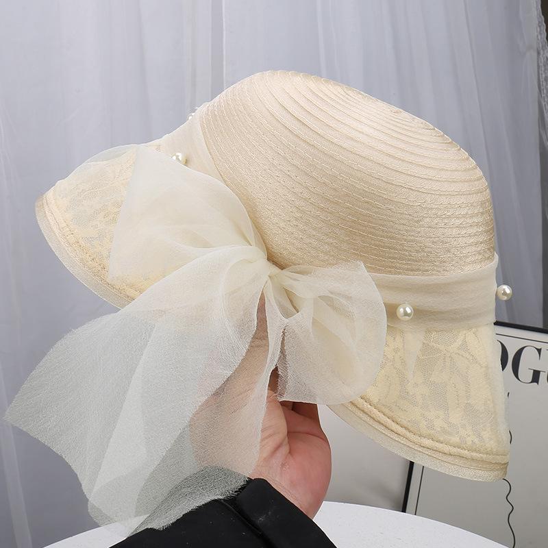 Spring and summer new lace mesh top hat women's sunscreen sun hat pearl bow decorative holiday mesh hat