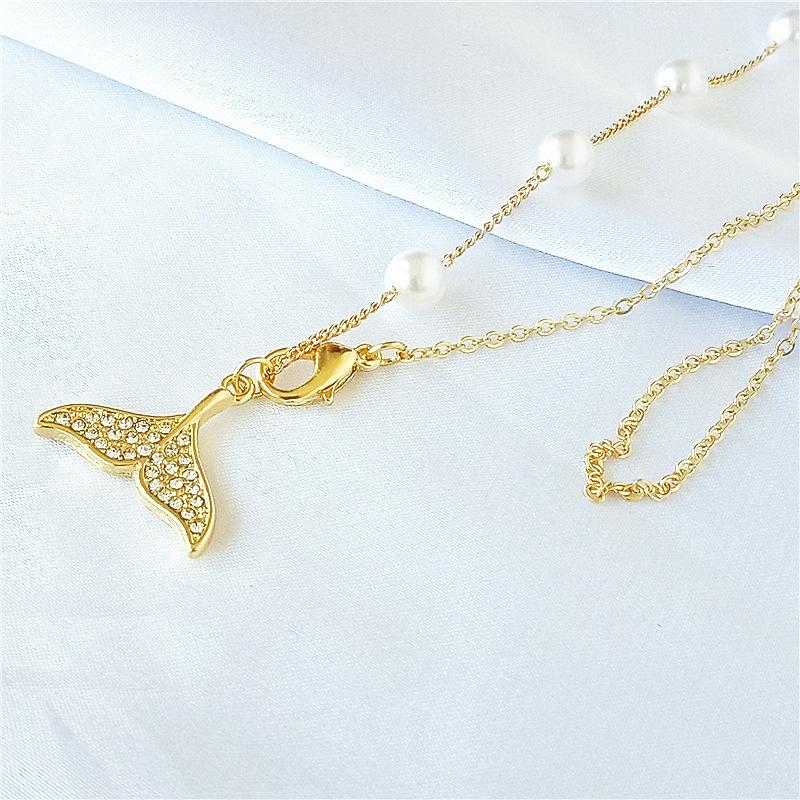 

Pearl necklace women s versatile niche light luxury high-end sense beaded sweater chain style new temperament necklace золотий