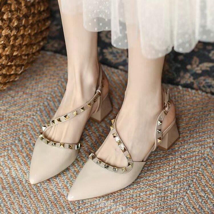 

Summer new pointed rivets medium heel nude high heels niche thick heel bag head empty sandals women 40 телесный