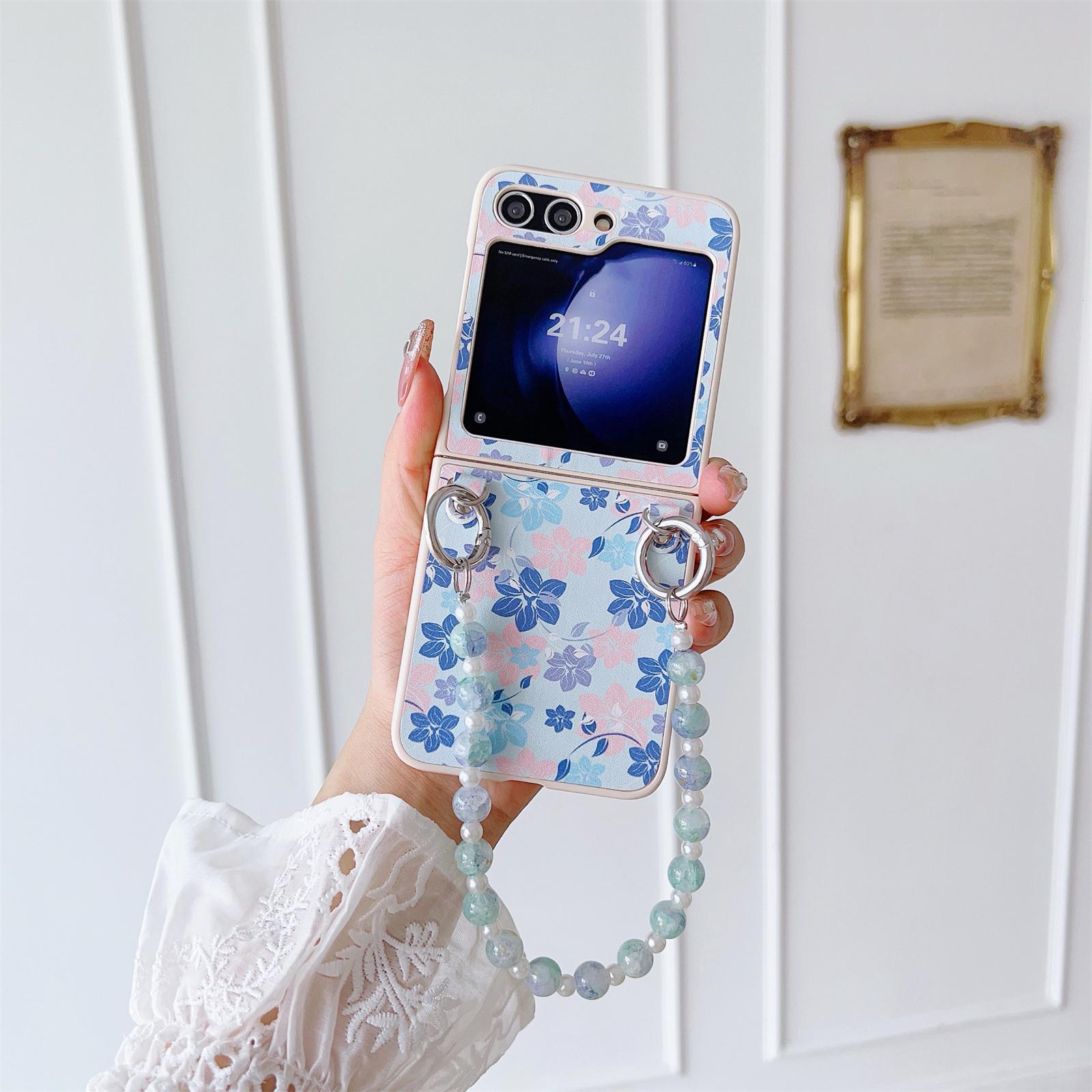 

For Samsung Galaxy Z Flip5 5G Folding Phone Case Flower Pattern PU+PC Cover with Beaded Hand Strap Blue Flower
