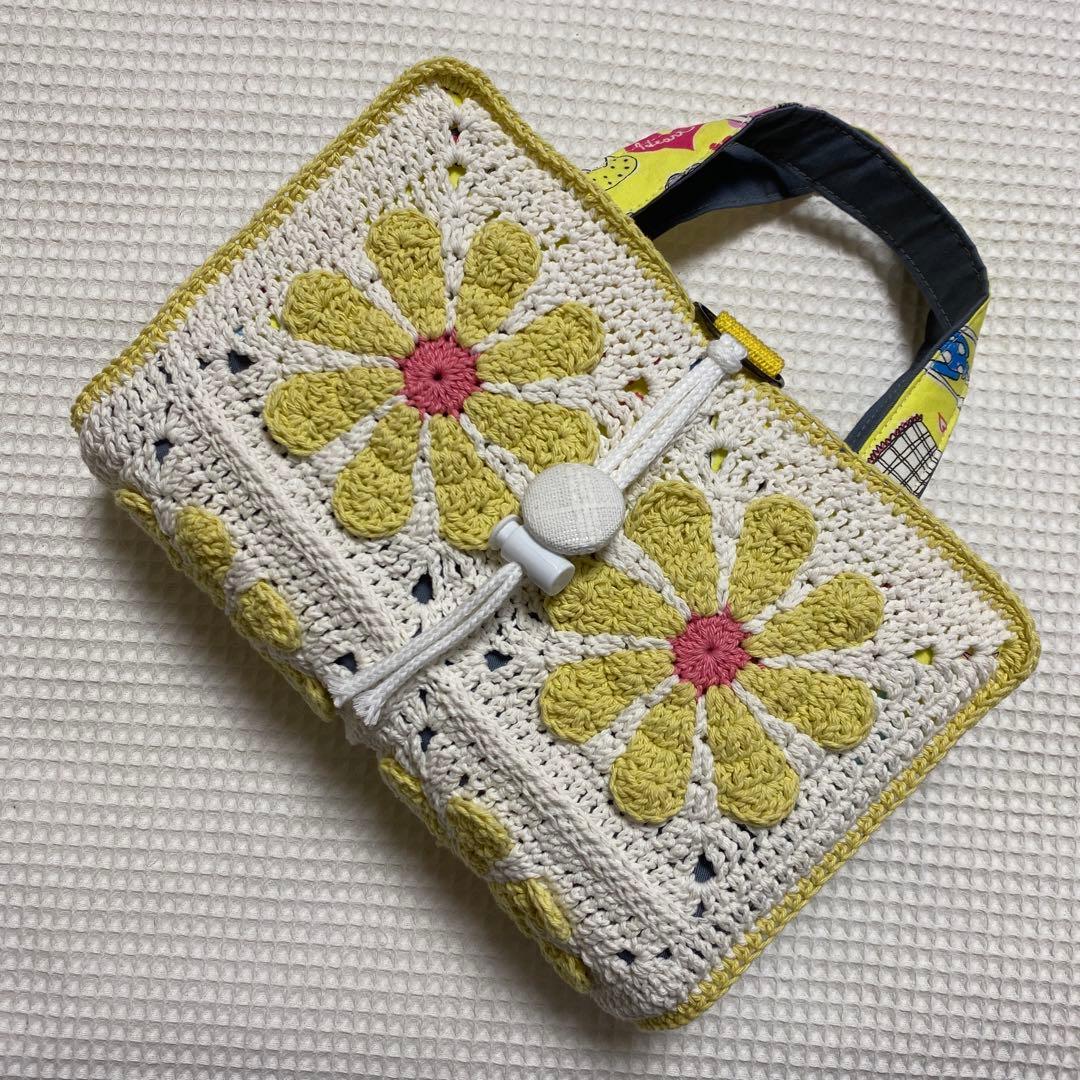 Used Review book cover daisy flower motif