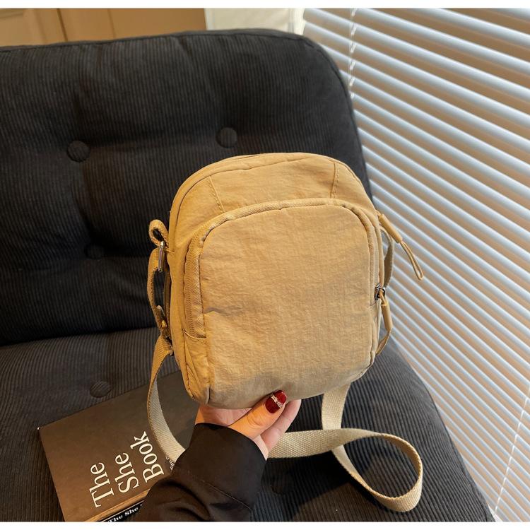 

Повседневная и легкая сумка для мобильного телефона весна и лето новая персонализированная однотонная наплечная сумка текстурная трендовая сумка-мессенджер маленькая тканевая сумка хаки