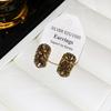 Exquisite and small diamond-encrusted earrings, earclips, mosquito coil disc, female sweet temperament, fashionable and simple,high-end stud earrings.