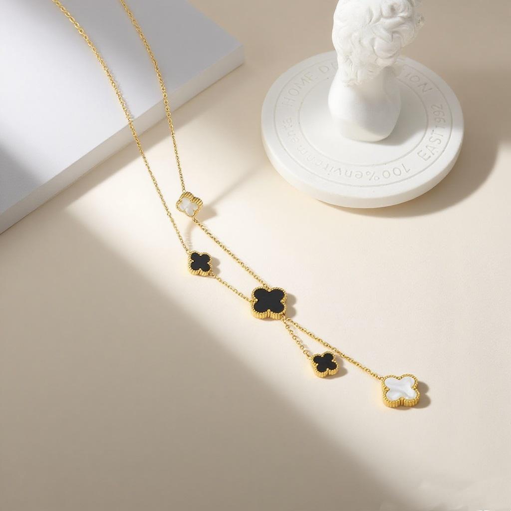 

Модное колье с подвеской-кисточкой в виде клевера для женщин - Двусторонняя ракушка, Легкое, Универсальная цепочка-замок.