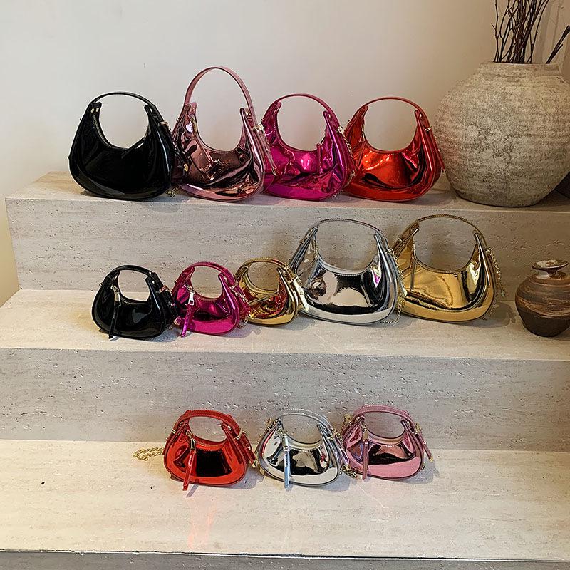 Women's bag 2025 new Mori fashion candy color niche hand bag ins single shoulder glossy dumpling bag tide