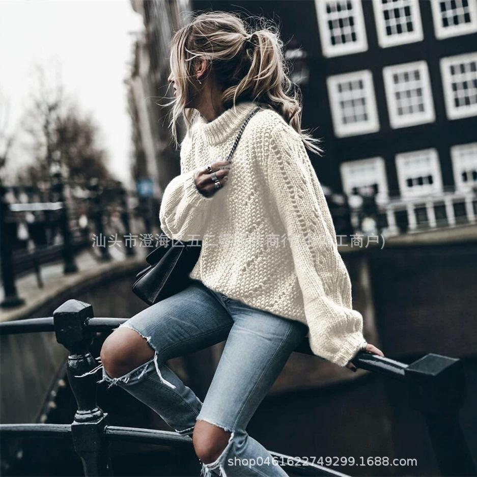 2026 European Street Style: Women's Solid Color Round Neck Long Sleeve Ripped Knitwear for Autumn/Winter