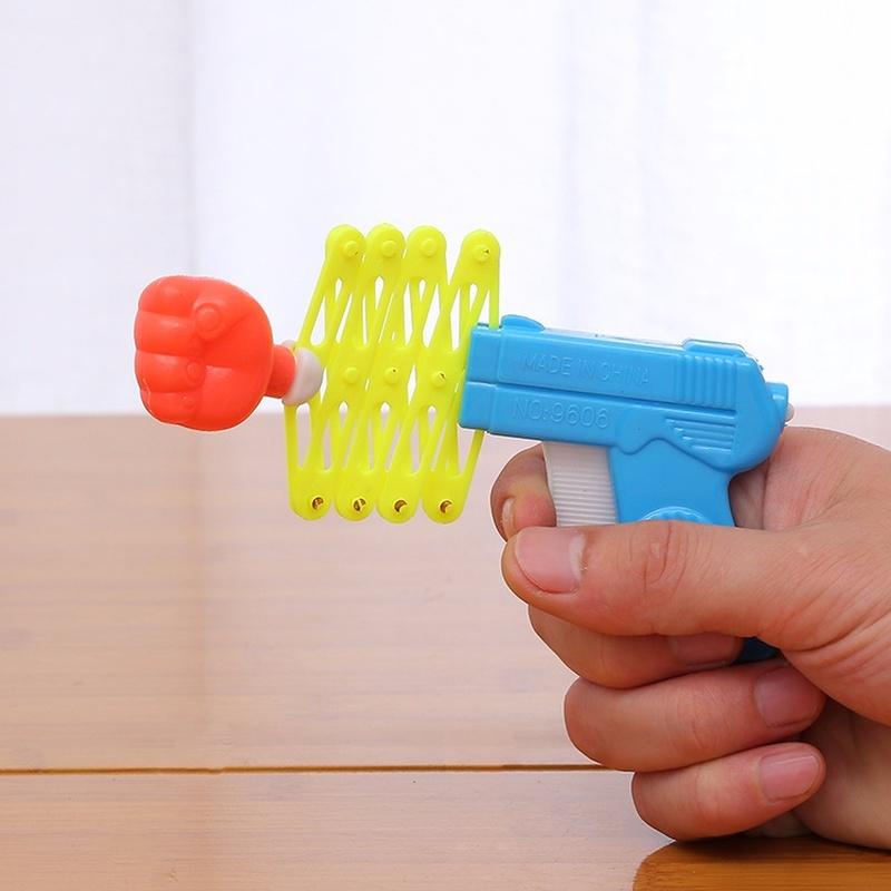 2Pcs   Children's Toy Guns  Creative Telescopic Fist Guns  April Fool's Toy Guns  and Spring Toy Gun