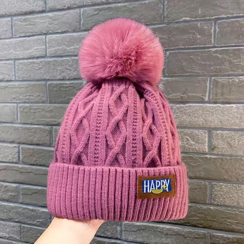 Women's Thick Warm Knitted Winter Hat with Ear Protection - Plush Wool and Pom-Pom Details