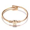 Stylish Women's Bracelet: Stainless Steel Peach Heart with Braided Cable and European-American 26 Letters Design