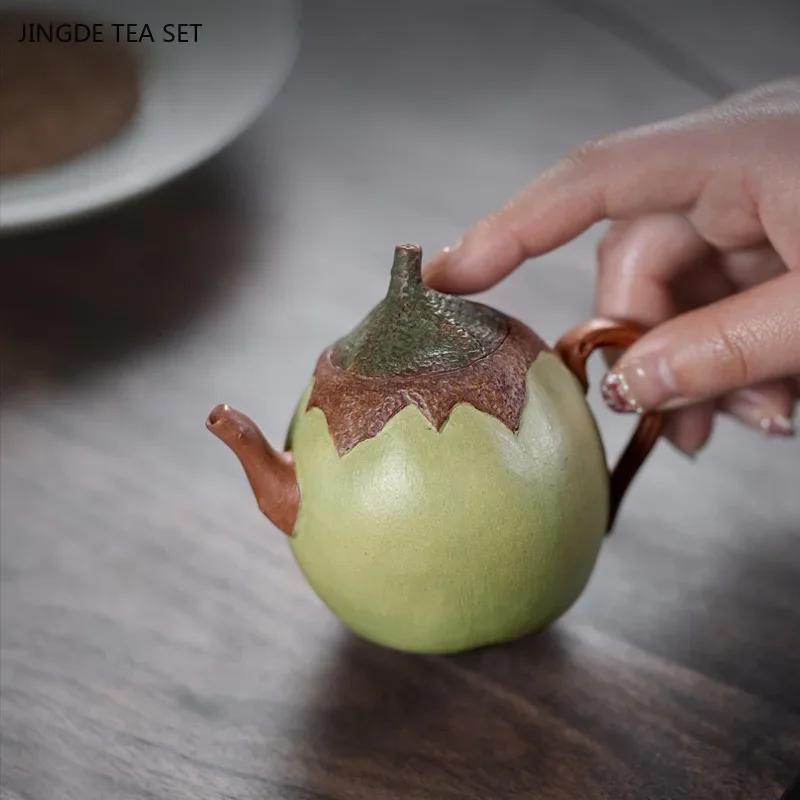

1PC 170ml High quality Yixing purple clay tepot Hand carving ball hole filter kettle Chinese zisha teapot beauty tea accessories