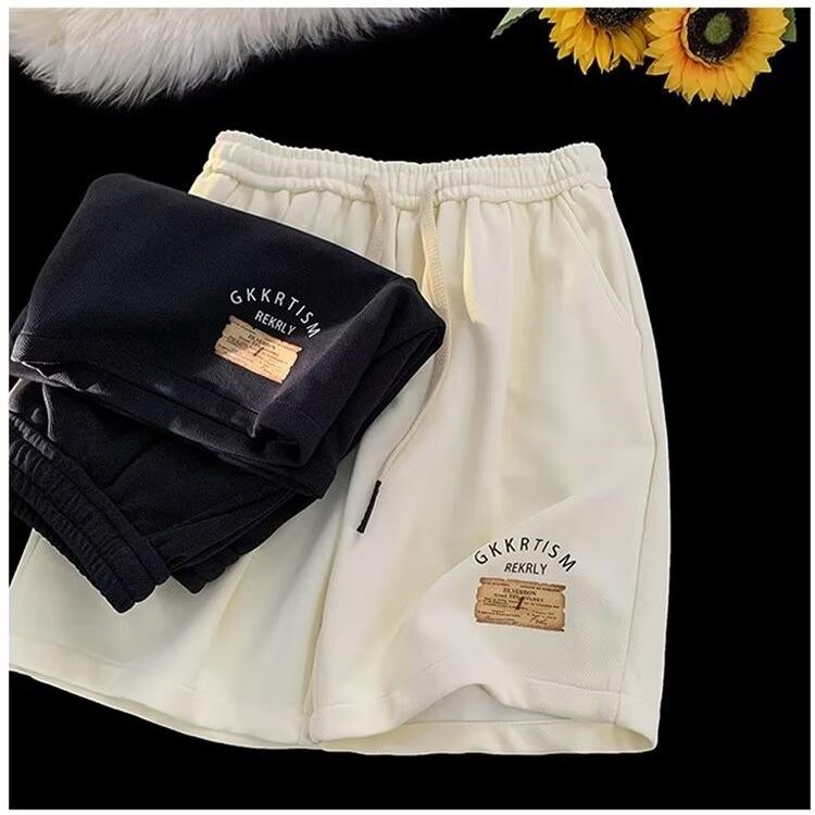 Pantaloncini sportivi casual rétro da uomo, estivi, larghi e versatili, moda per adolescenti, pantaloni sportivi a cinque punte