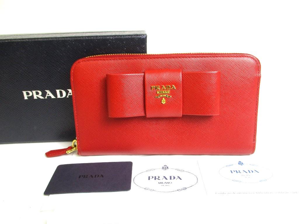 

Authentic PRADA Red Saffiano Leather Ribbon Motif Round Zip Long Wallet #a334 Refurbished