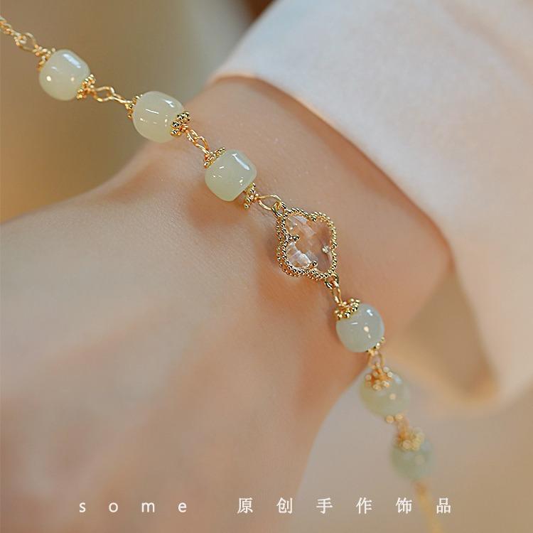Clover*Hetian jade four-leaf clover bracelet, lucky niche design, new model that enhances complexion
