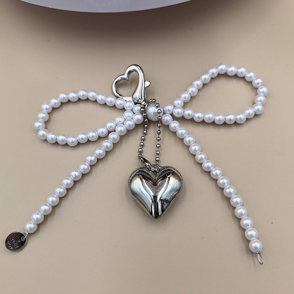 

Корейский Шик Жемчужный Бант и Серебряное Сердце Брелок для AirPods и Телефонов