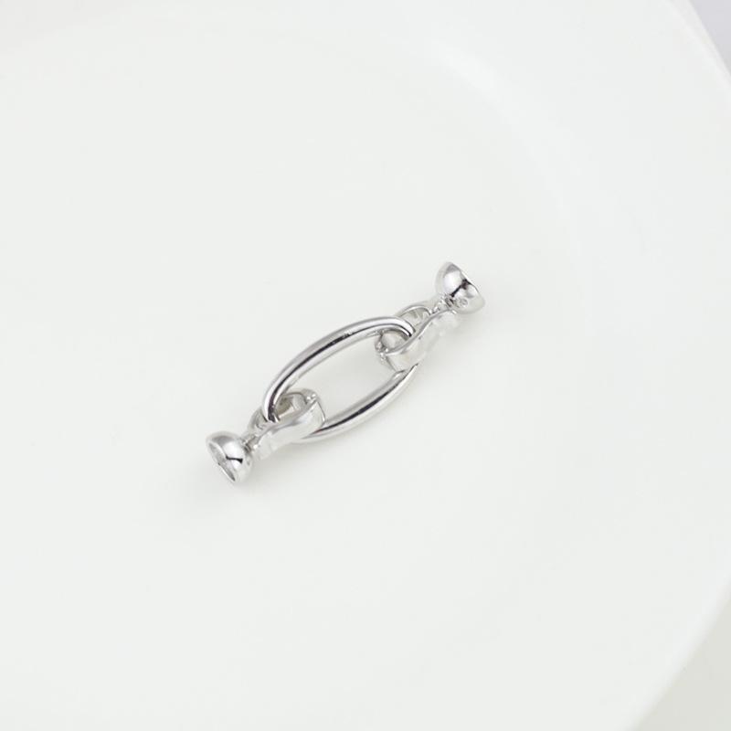 

З єднувач для кольє та браслета з подвійною пряжкою у формі овального персикового серця, що зберігає колір