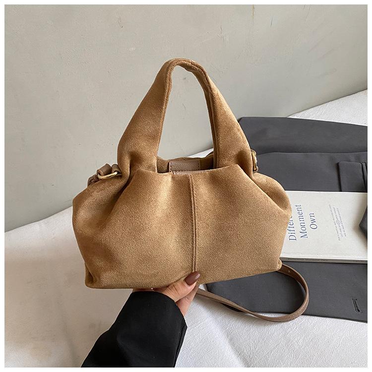 

New retro portable commuter bag women s large-capacity ultra-fire suede bucket bag shoulder messenger bag хаки