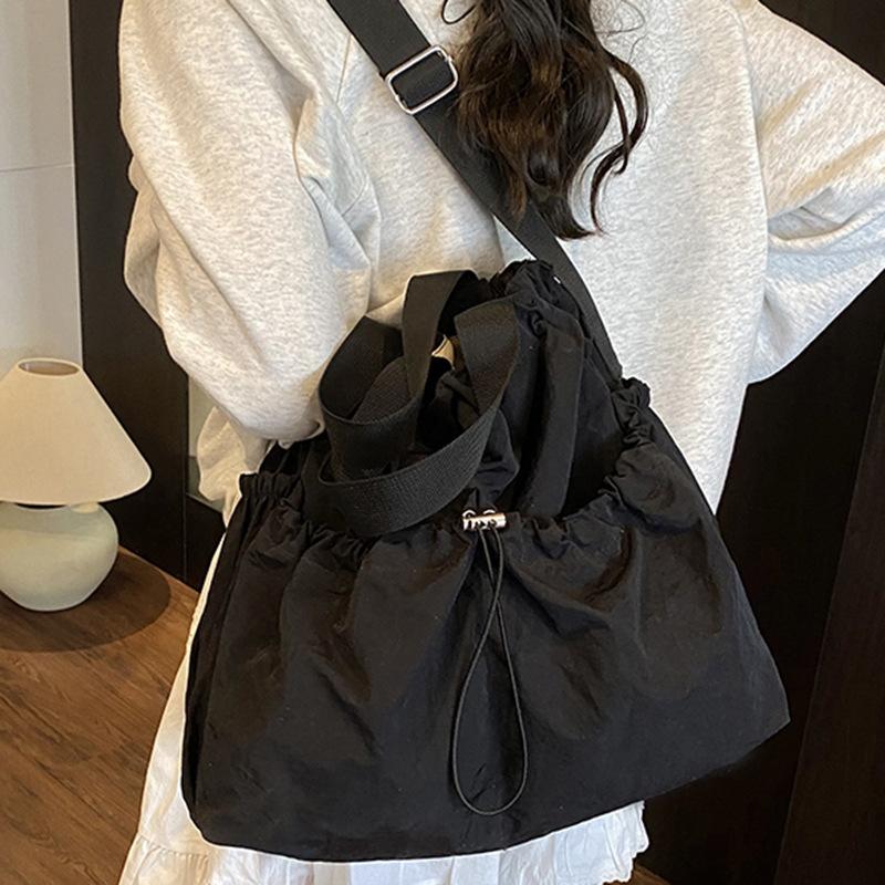 2025 Japanese Hansen Lazy Wind Canvas Bag Women's Large Capacity Drawstring Handbag High Value College Student Class Bag