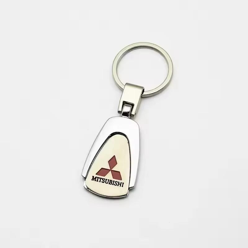 

Metal/Leather Car Keychain Badge Emblem For Mitsubishi Grandis Outlander Xl Lancer EX Pajero Delica Space Star Galant Space Star