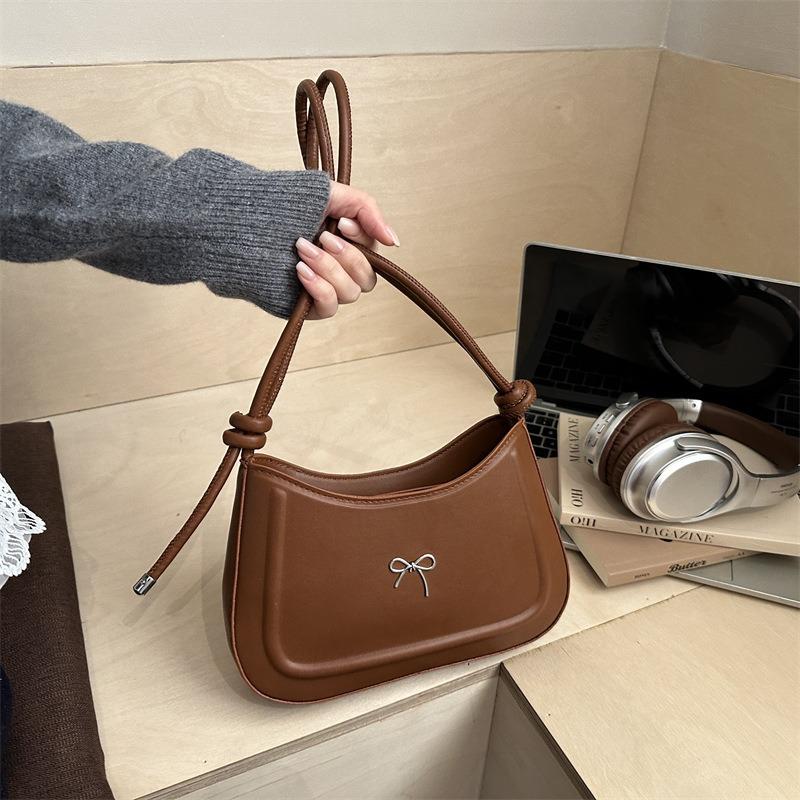 Simple pressure shell autumn temperament bow decorative design texture large capacity casual axillary shoulder women's bag